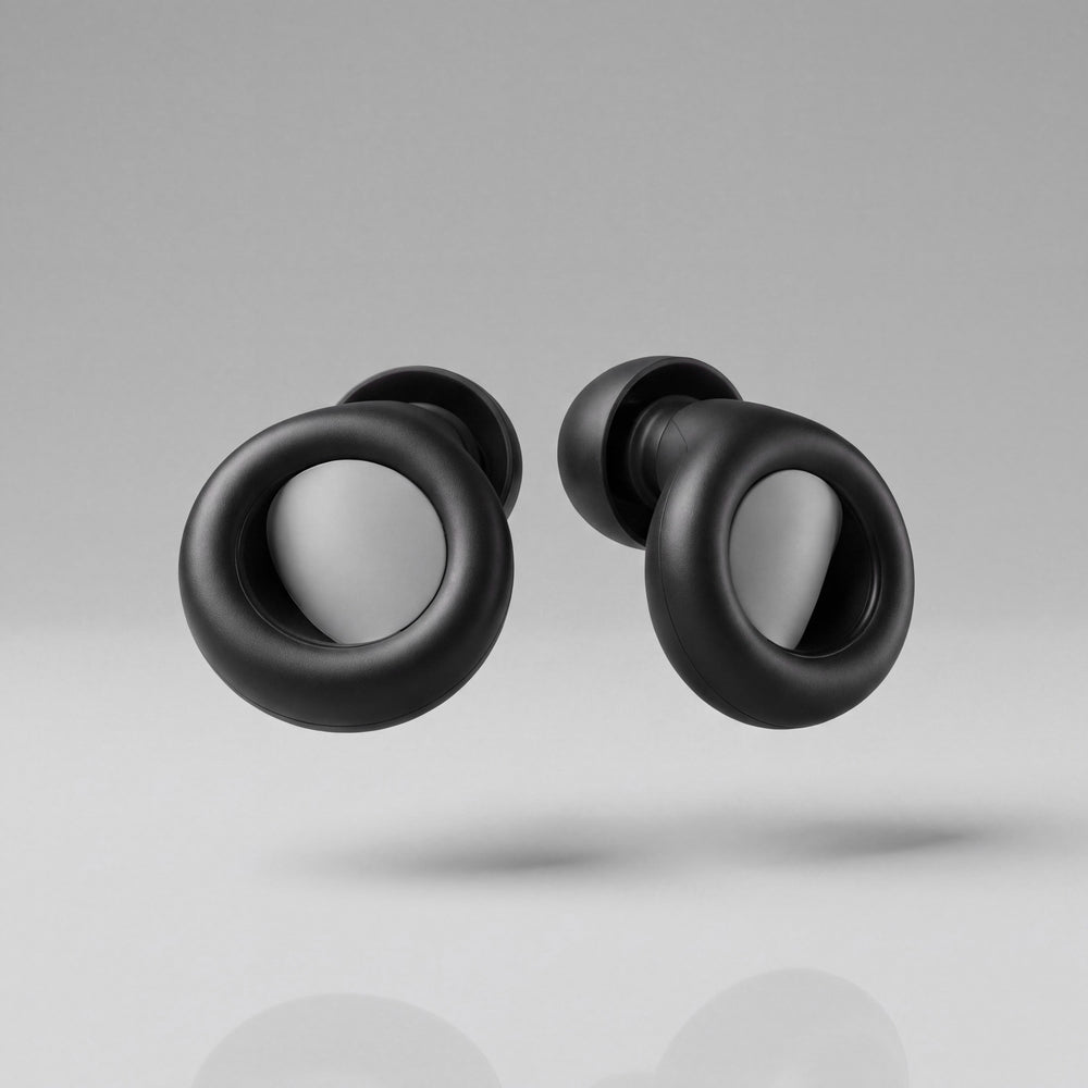 A pair of Vespré Deep earplugs in Matte Black