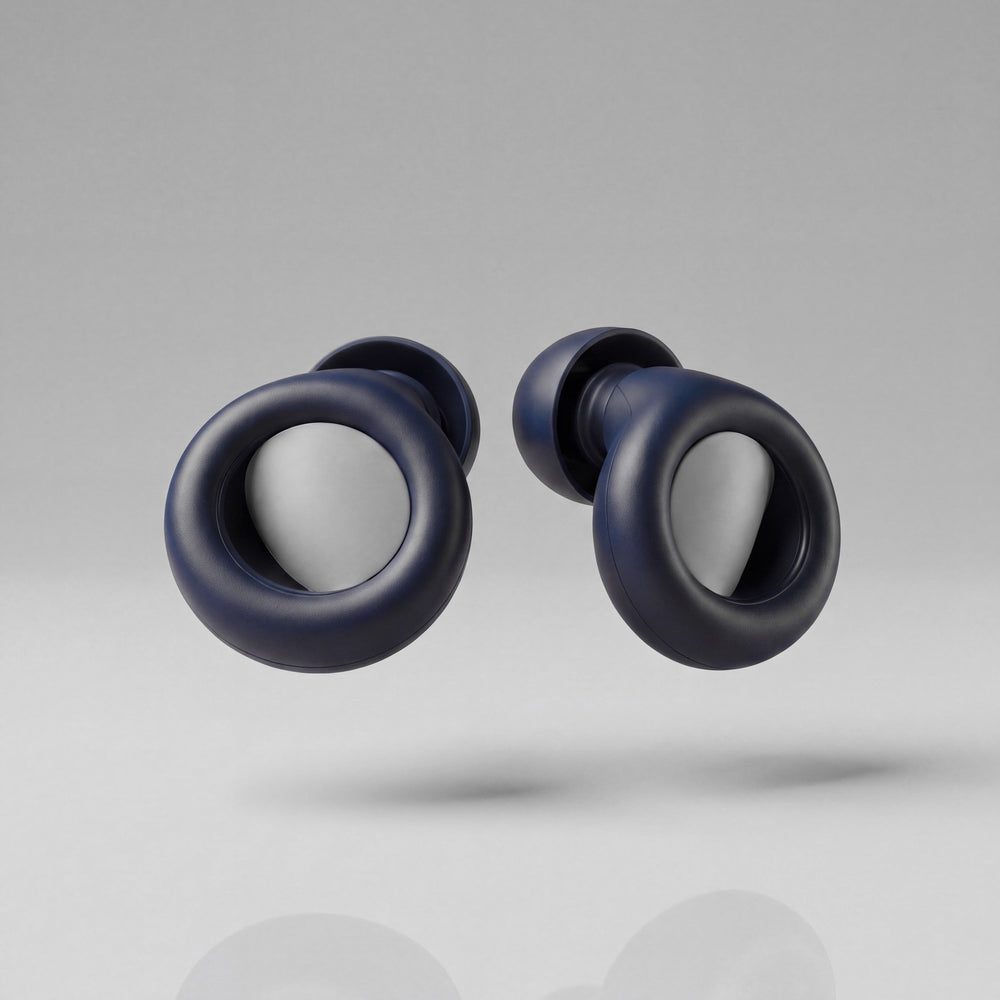 A pair of Vespré Deep earplugs in Navy Blue