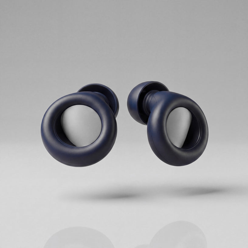 A pair of Vespré Deep earplugs in Navy Blue