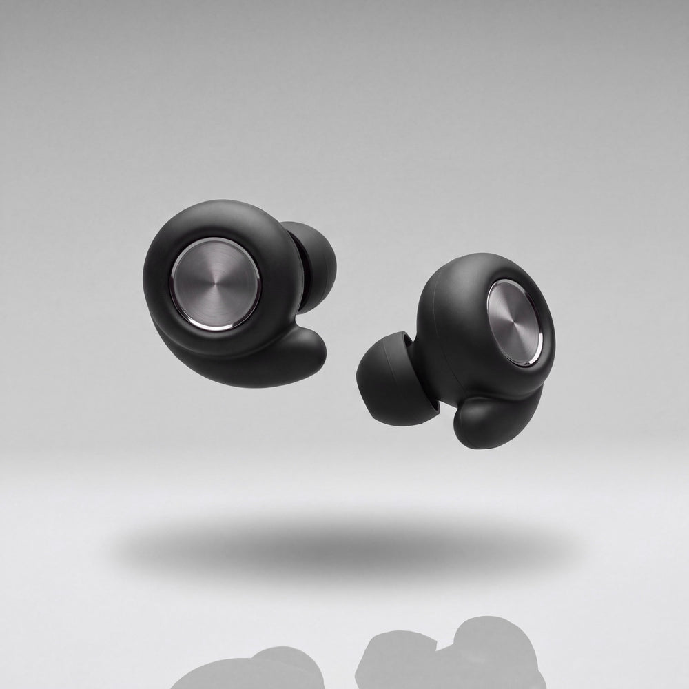 A pair of Vespré Grip earplugs in Matte Black