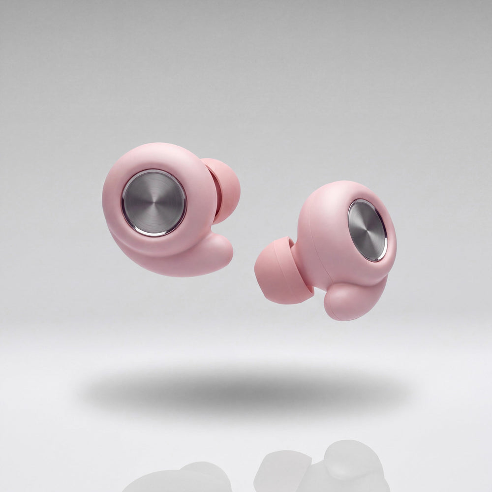A pair of Vespré Grip earplugs in Rose