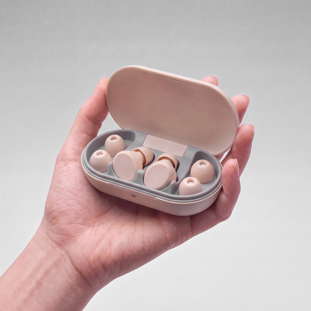 Vespré Rest in Ivory, open case held in a hand for scale