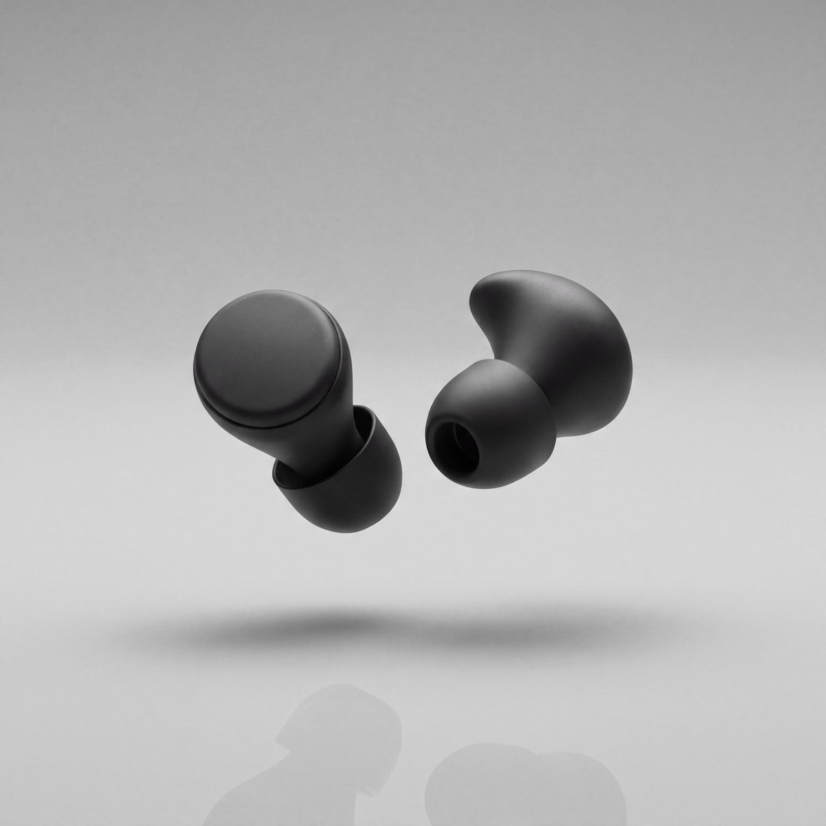 A pair of Vespré Rest earplugs in Matte Black
