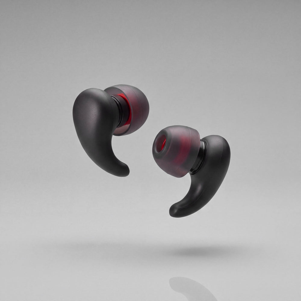 A pair of Vespré Wing earplugs in Matte Black