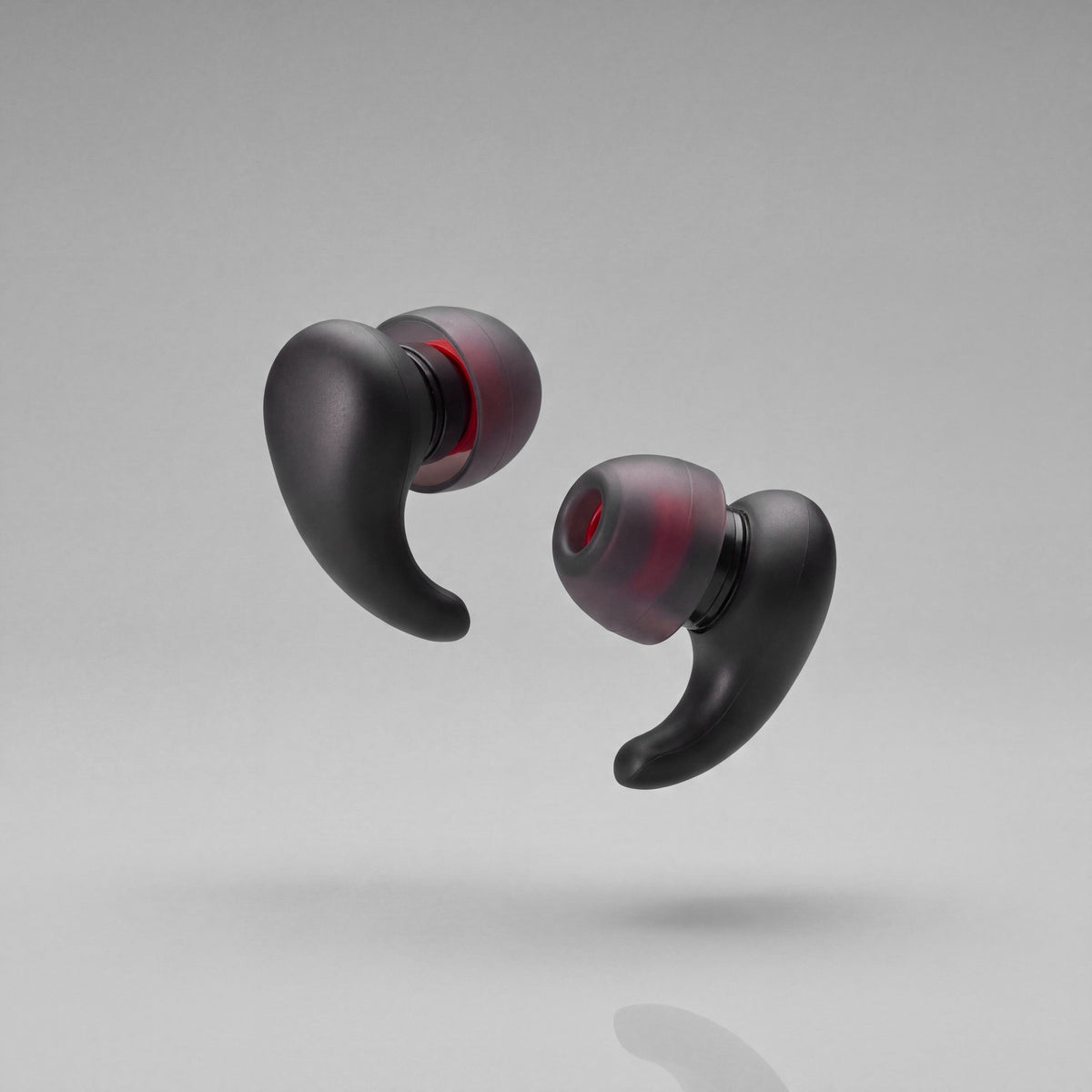 A pair of Vespré Wing earplugs in Matte Black