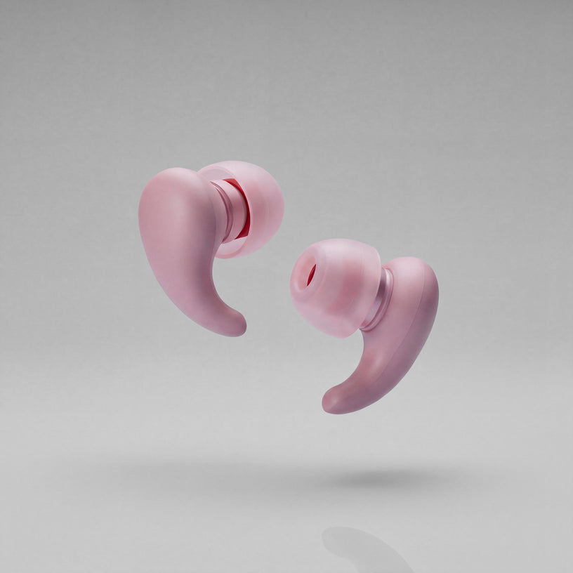 A pair of Vespré Wing earplugs in Rose