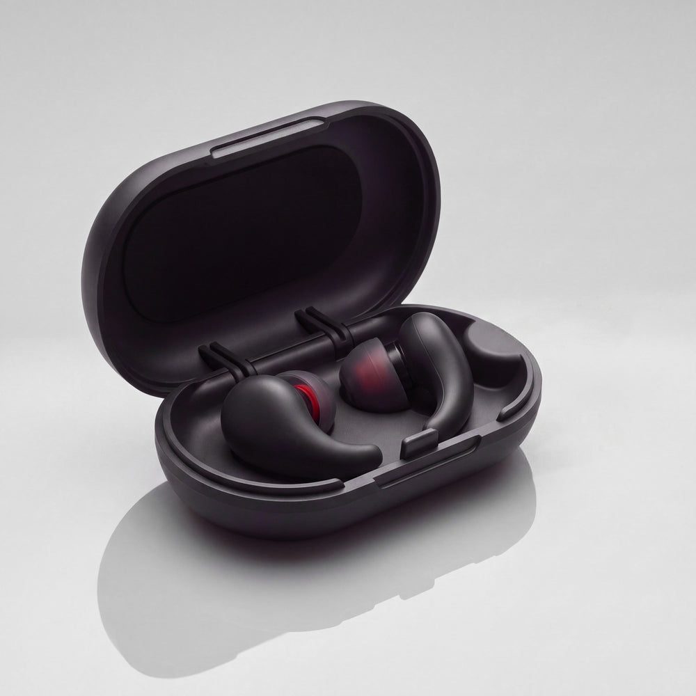Vespré Wing in Matte Black, both earplugs in the open case